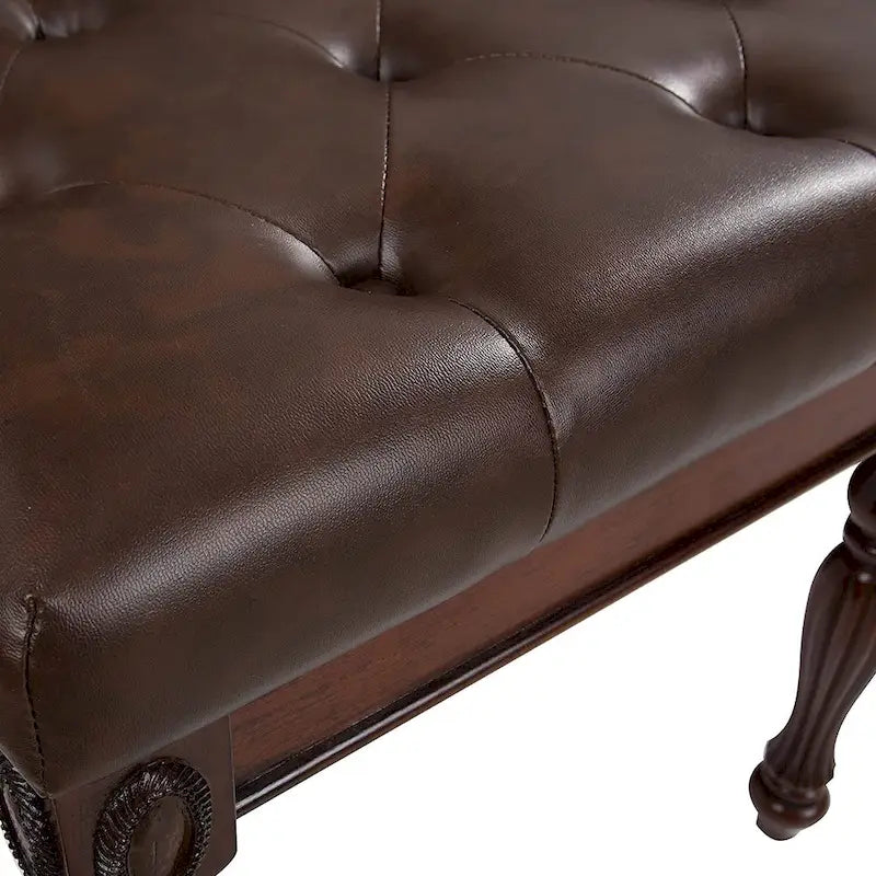 Banco tapizado tradicional para recibidor, con botones capitoné y patas de madera torneada